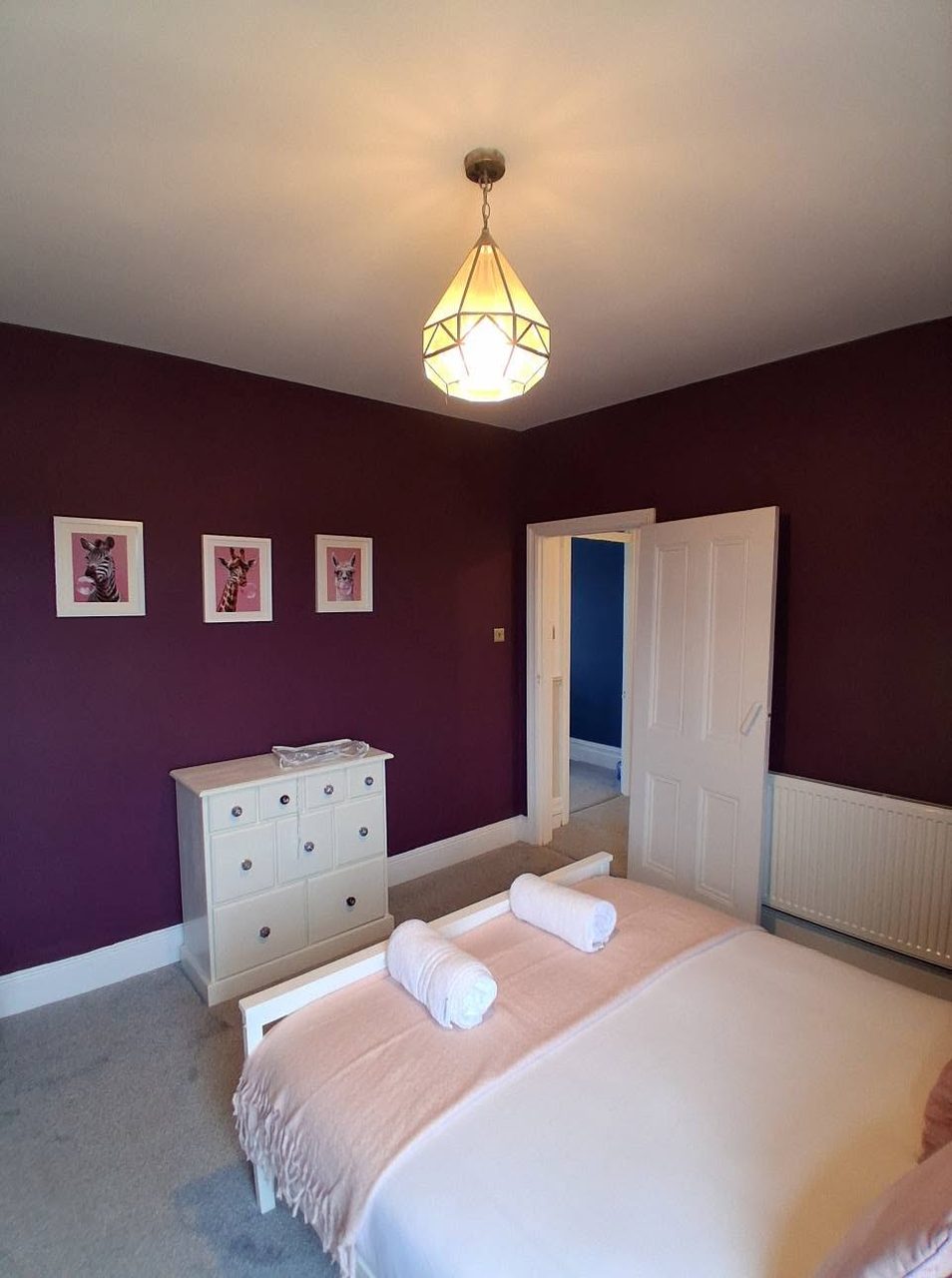 Feature bedroom in warm aubergine