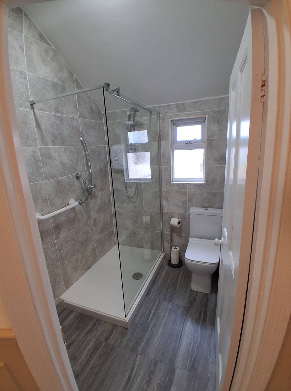 A brand-new walk-in shower room
