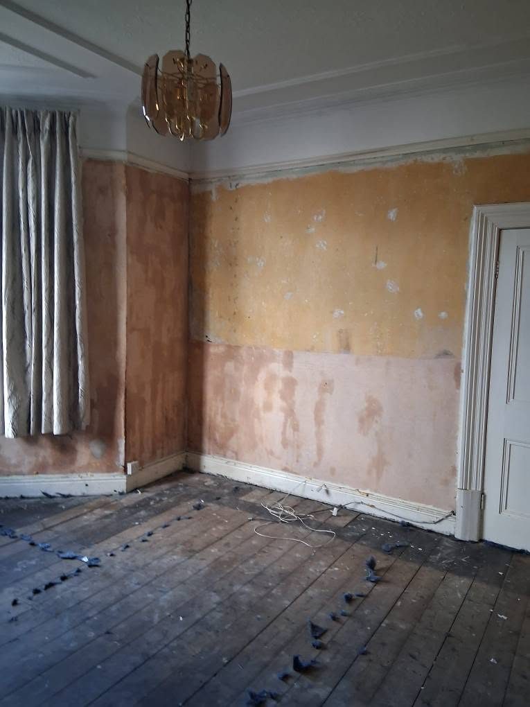 Bare boards and bare walls before work began